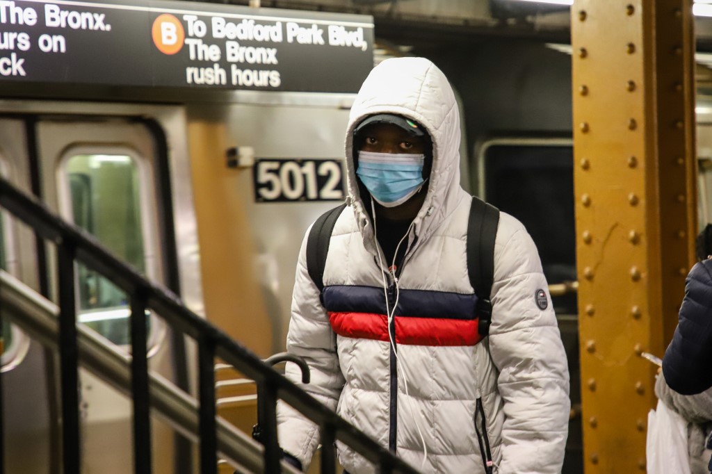 People wearing medical masks are seen on the New York subway during a Coronavirus Covid-19 pandemic in the United States